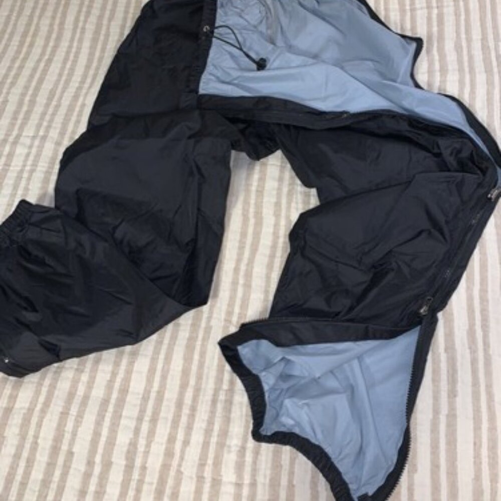 Red Ledge. Full zip open side legs. 100% waterproof pull on pants. Sz S (unisex)